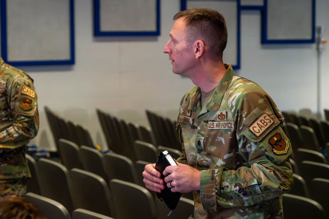 U.S. Air Force Lt. Col. Chris Bahrij, 13th Combat Air Base Squadron commander, engages with Airmen assigned to the 13th CABS.