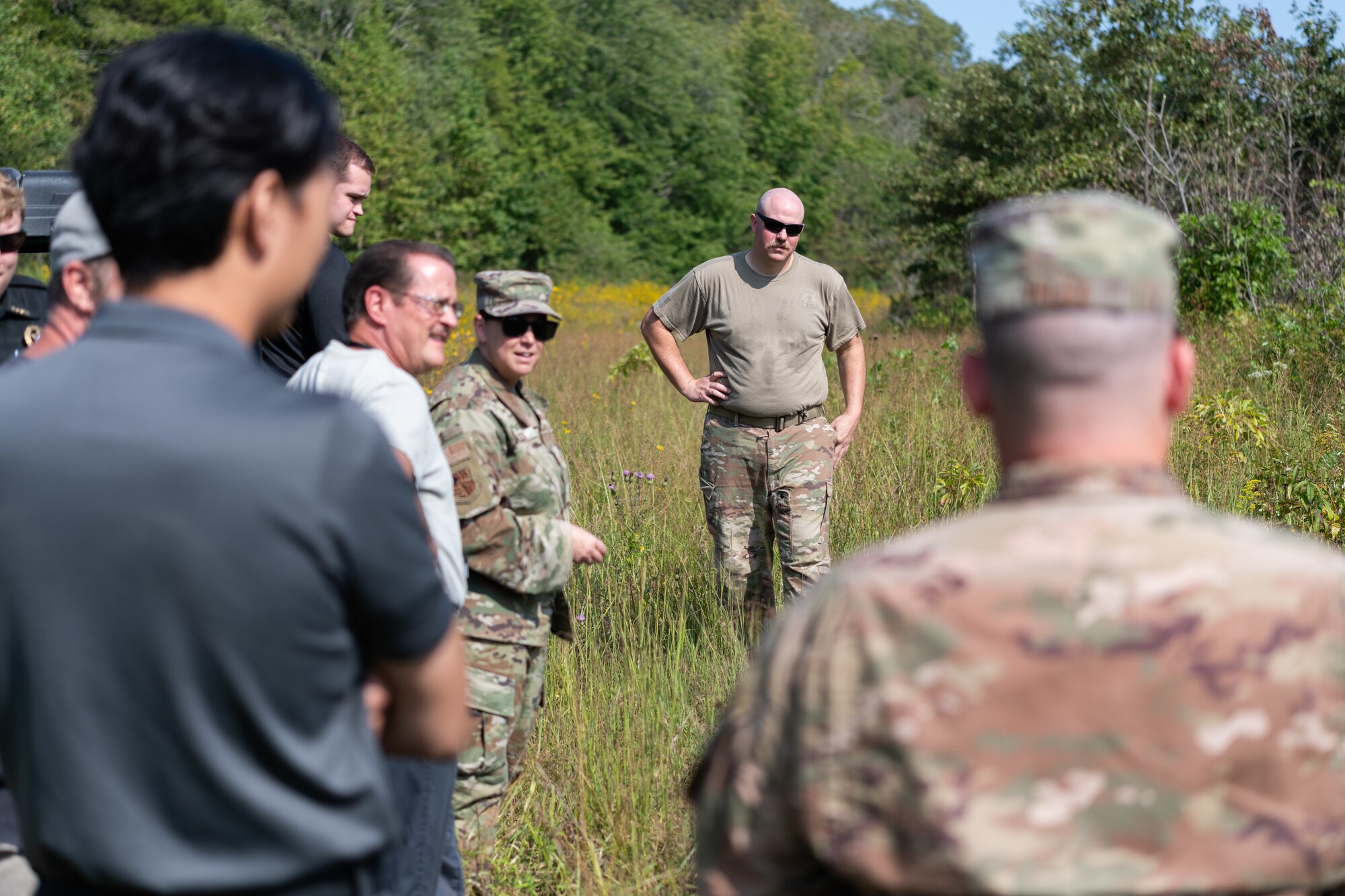 Personnel from Arnold Air Force Base, Tenn., and Eglin Air Force Base, Florida, gather at Arnold AFB Sept. 10, 2024, to discuss the disposal of leftover explosive materials from a recent test at Arnold. The 96th Civil Engineer Squadron Explosive Ordnance Disposal Flight from Eglin helped plan both the testing and the disposal of the remaining explosives. These materials were destroyed in a remote area of Arnold AFB using a charge of explosives which was detonated. (U.S. Air Force photo by Keith Thornburgh)