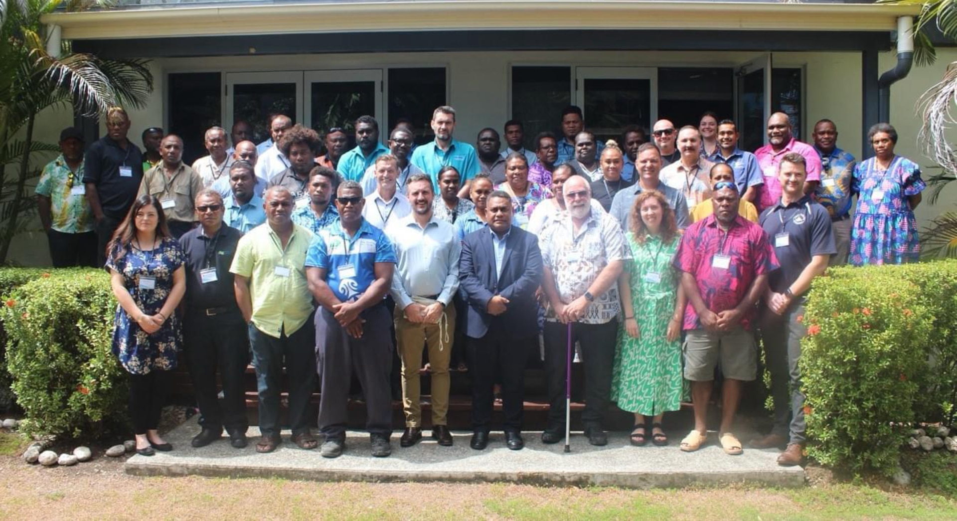 Participants in a marine pollution incident workshop pose for a group photo in Honiara, Solomon Islands, Oct. 9, 2024. U.S. Coast Guard personnel from the Marine Environmental Response Regional Activity Center and District 14 Response Advisory Team collaborated with representatives from various Pacific Island nations to prepare for marine pollution incidents. (U.S. Coast Guard photo by Chief Warrant Officer 3 Shannon McGregor)