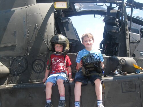 A childhood photo of Nathan and Samuel Urdzik sitting on a helicopter. Nathan graduated from Basic Military Training on Aug. 29 and Samuel is a United States Air Force Academy Cadet 3rd Class.