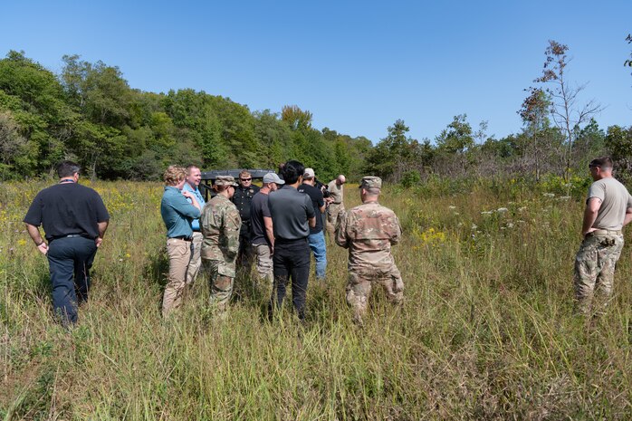 Personnel from Arnold Air Force Base, Tenn., and Eglin Air Force Base, Florida, gather at Arnold AFB Sept. 10, 2024, to discuss the disposal of leftover explosive materials from a recent test at Arnold. The 96th Civil Engineer Squadron Explosive Ordnance Disposal Flight from Eglin helped plan both the testing and the disposal of the remaining explosives. These materials were destroyed in a remote area of Arnold AFB using a charge of explosives which was detonated. (U.S. Air Force photo by Keith Thornburgh)