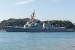 Sailors assigned to the Arleigh Burke-class guided-missile destroyer USS Preble (DDG 88) man the rails as the ship pulls into Commander, Fleet Activities Yokosuka.