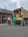 North Carolina National Guard members deliver supplies in Watauga County, North Carolina, in response to the impacts of Hurricane Helene.