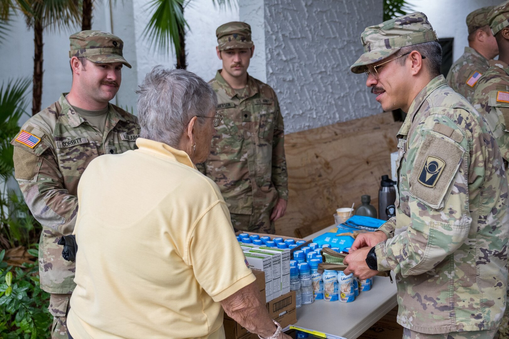 U.S. Soldiers from the Florida and South Carolina National Guard distribute water, meals and sanitation kits to residents of St. Lucie County, Florida, who were impacted by tornadoes caused by Hurricane Milton, Oct. 11, 2024. Soldiers and Airmen will staff point of distribution centers across disaster-affected areas of the state as relief efforts continue.