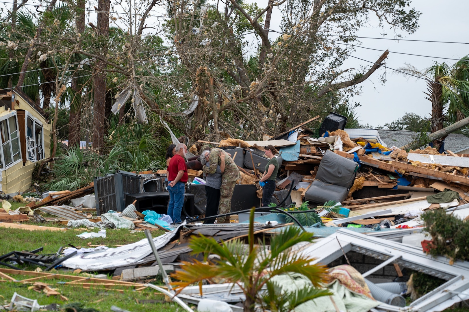 U.S. Soldiers assigned to Alpha Company, 1st Battalion, 124th Infantry Regiment, 53rd Infantry Brigade Combat Team, deliver water, meals and non-perishable goods to senior citizens in the Spanish Lake community in Port St. Lucie, Florida, Oct. 11, 2024.