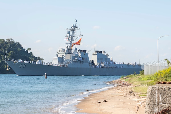 Sailors assigned to the Arleigh Burke-class guided-missile destroyer USS Preble (DDG 88) man the rails as the ship pulls into Commander, Fleet Activities Yokosuka.