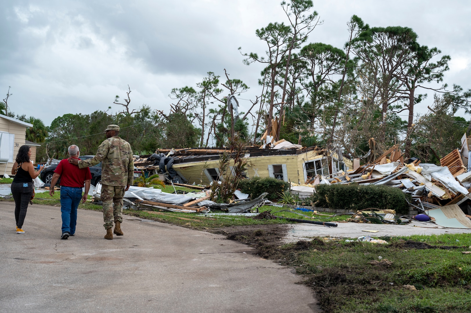 U.S. Soldiers assigned to Alpha Company, 1st Battalion, 124th Infantry Regiment, 53rd Infantry Brigade Combat Team, deliver water, meals and non-perishable goods to senior citizens in the Spanish Lake community in Port St. Lucie, Florida, Oct. 11, 2024.