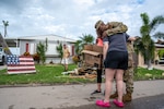 U.S. Soldiers assigned to Alpha Company, 1st Battalion, 124th Infantry Regiment, 53rd Infantry Brigade Combat Team, deliver water, meals and non-perishable goods to senior citizens in the Spanish Lake community in Port St. Lucie, Florida, Oct. 11, 2024. The state of Florida established point of distribution centers throughout Florida and deployed staging areas to ensure supplies were available to those in need.