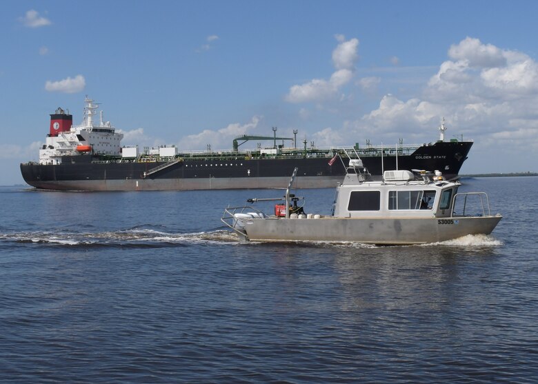 The U.S. Army Corps of Engineers Hydrographic Survey Boat teams from the Jacksonville District escorts the Golden State into the Tampa Harbor.  The U.S. Army Corps of Engineers Hydrographic Survey Boat teams surveyed the Tampa Harbor and Gulf Intracoastal Waterway which assisted the Coast Guard with quickly restoring navigation channels in the aftermath of Hurricane Milton to facilitate the arrival of commercial fuel and shipping vessels in the Tampa Harbor.