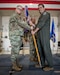 Col. Matthew Quenichet (right), incoming commander for the 123rd Airlift Wing, accepts the wing guidon from Brig. Gen. David Mounkes, the Kentucky National Guard’s assistant adjutant general for Air, as Quenichet assumes command of the wing during a change-of-command ceremony at the Kentucky Air National Guard Base in Louisville, Ky., Oct. 11, 2024. Quenichet replaces Col. Bruce Bancroft, who has led the unit since 2021 and will be moving into a new leadership role at Joint Force Headquarters—Kentucky. (U.S. Air National Guard photo by Master Sgt. Joshua Horton)