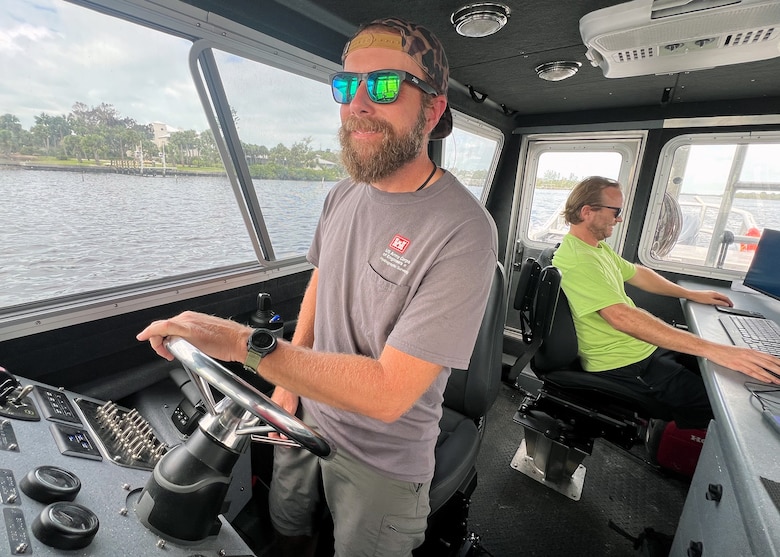 Kent Cardwell, a small craft operator and Travis Smith, a geodesist both with the U.S. Army Corps of Engineers Jacksonville District surveyed the Tampa Harbor and Gulf Intracoastal Waterway which assisted the Coast Guard with quickly restoring navigation channels in the aftermath of Hurricane Milton to facilitate the arrival of commercial fuel and shipping vessels in the Tampa Harbor. (USACE photo by Mark Rankin)
