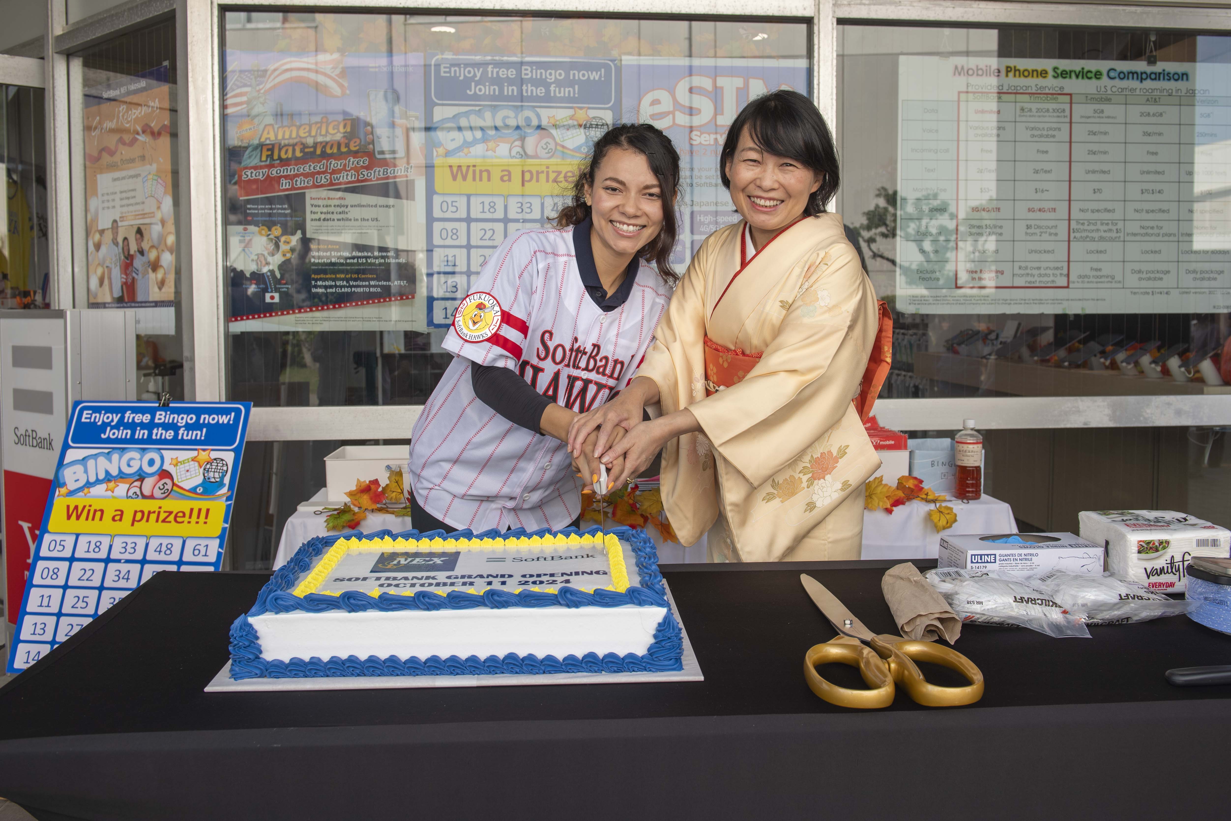 Navy Exchange Yokosuka staff celebrate the Grand Re-Opening of the Softbank office onboard Commander, Fleet Activities Yokosuka October 11, 2024.