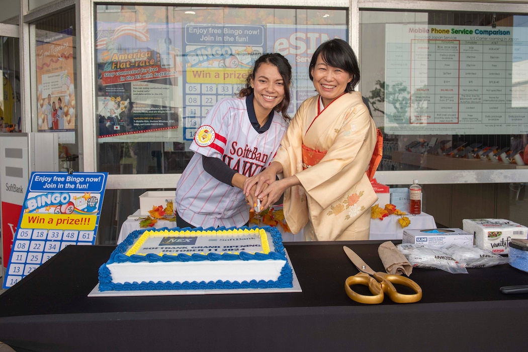 Navy Exchange Yokosuka staff celebrate the Grand Re-Opening of the Softbank office onboard Commander, Fleet Activities Yokosuka October 11, 2024.