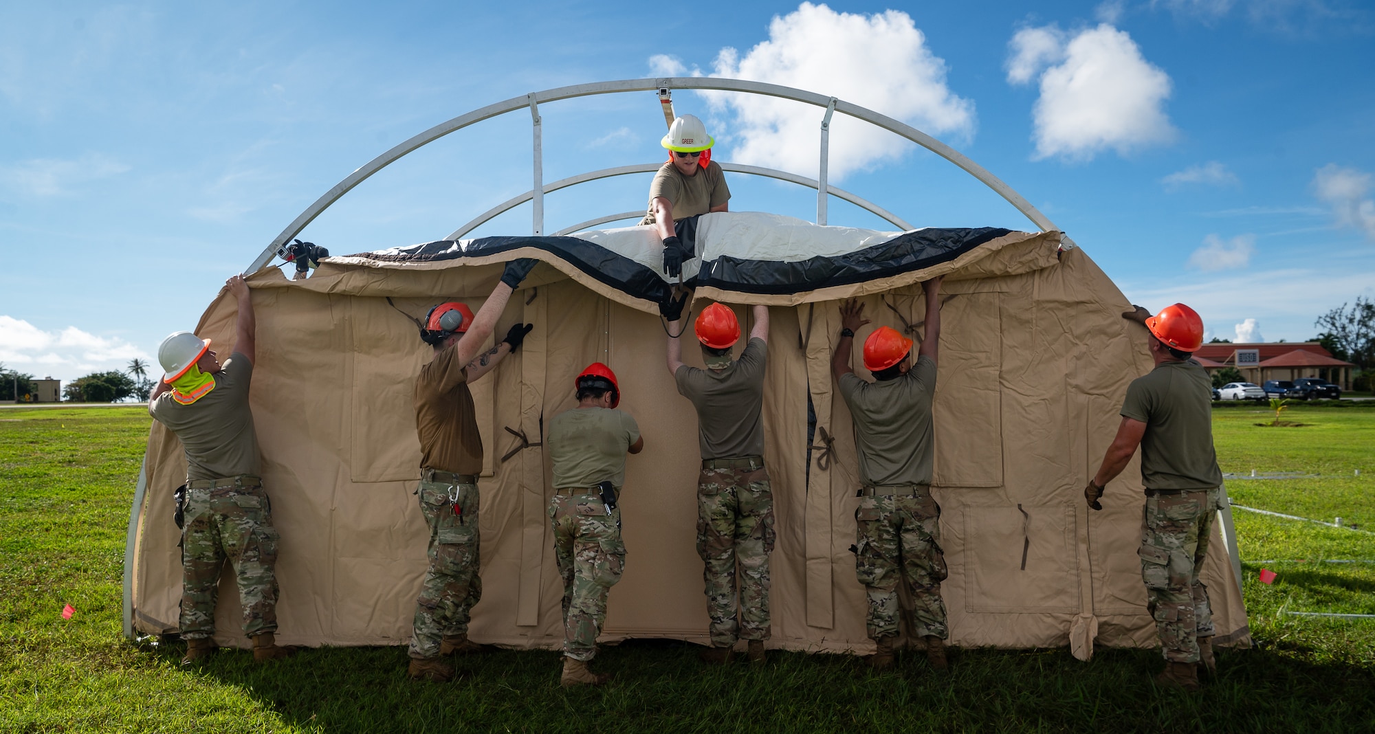 36th Civil Engineer Squadron Airmen prepare tents in preparation for Slingstone 24-4 at Andersen Air Force Base, Guam, Oct. 15, 2024.  This exercise is to showcase Andersen AFB capabilities to deter opportunistic acts of aggression through forward presence and the ability to rapidly respond to crises. (U.S. Air Force photo by Staff Sgt. Pedro Tenorio)