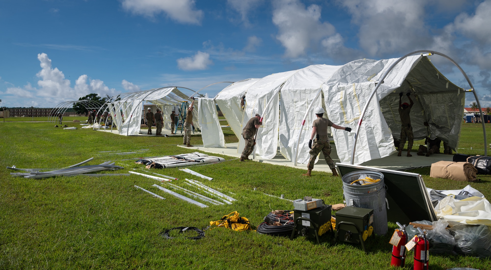36th Civil Engineer Squadron Airmen prepare tents in preparation for Slingstone 24-4 at Andersen Air Force Base, Guam, Oct. 15, 2024.  This exercise is to showcase Andersen AFB capabilities to deter opportunistic acts of aggression through forward presence and the ability to rapidly respond to crises. (U.S. Air Force photo by Staff Sgt. Pedro Tenorio)