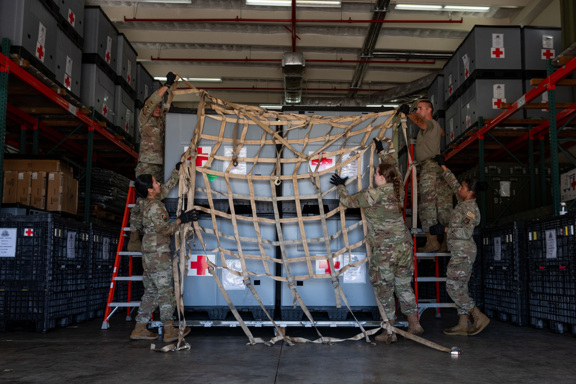 U.S. Air Force Airmen assigned to the 36th Medical Group prepares to secure air trans clinics during Slingstone 24-4 at Andersen Air Force Base, Guam, Oct. 15, 2024. Air trans clinics are “to-go” clinics used to care for servicemembers in contingency locations. (U.S. Air Force photo by Senior Airman Jasmine M. Barnes)
