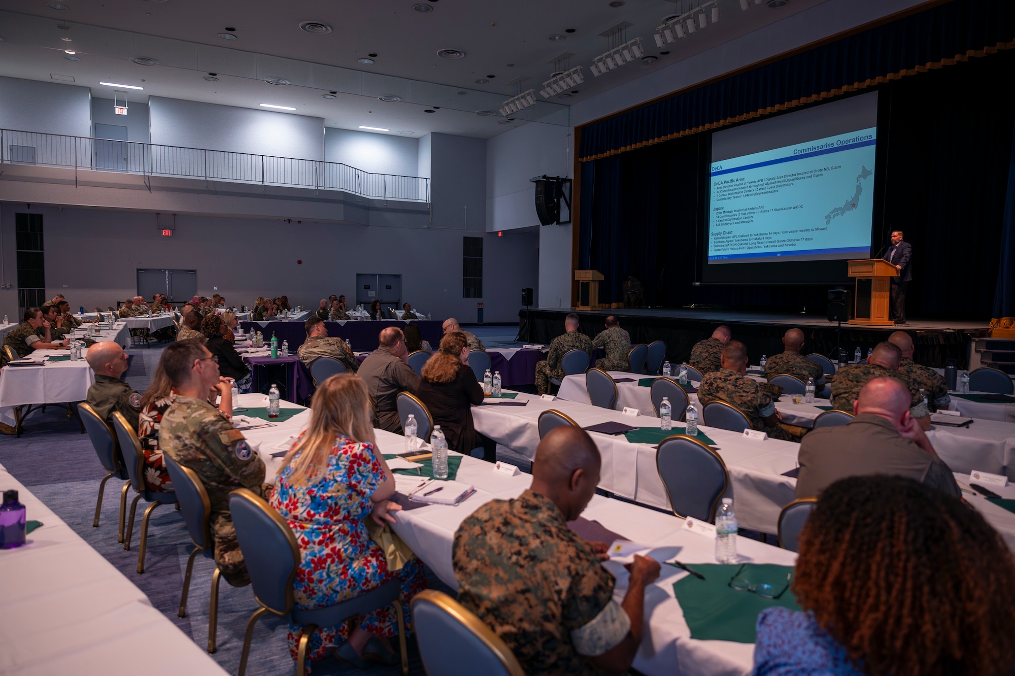 A briefer speaks during a combined commanders conference at Yokota Air Base, Japan, Oct. 7, 2024. The conference provided a streamlined environment to relay critical information and updates to leaders across the command. (U.S. Air Force photo by Senior Airman Samantha White)