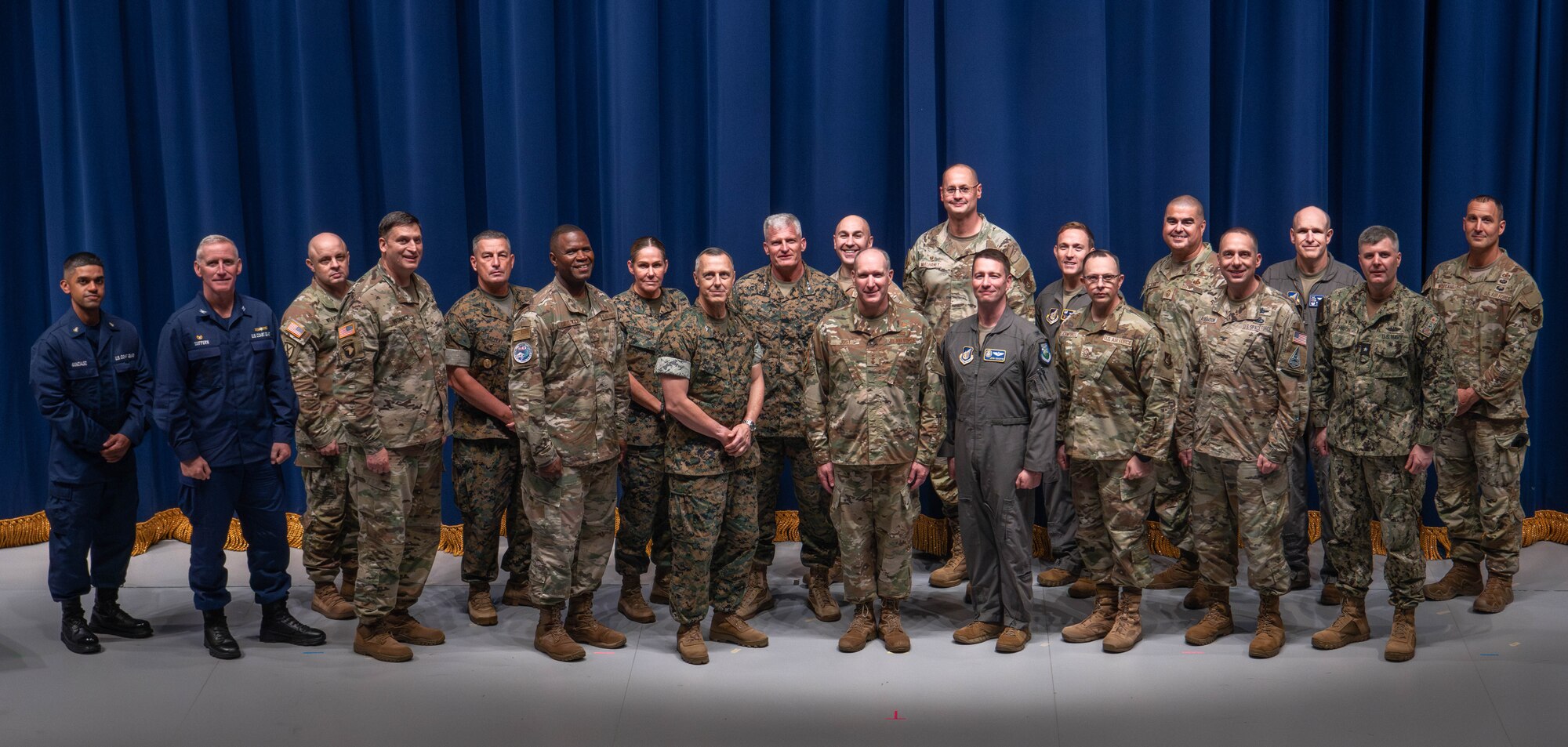 U.S. Forces Japan, Fifth Air Force, and Yokota leadership take a group photo during a combined commanders conference at Yokota Air Base, Japan, Oct. 8, 2024. Commanders, senior enlisted leaders and spouses from 24 units throughout the Indo-Pacific region gathered to discuss military force structure, access to medical care and quality of life. (U.S. Air Force photo by Senior Airman Alexzandra Gracey)