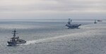 The Harry S. Truman Carrier Strike Group transits the Strait of Dover, Oct. 14, for the North Sea where the strike group will conduct operations with Allies and partners. The Harry S. Truman Carrier Strike Group (HSTCSG), is on a scheduled deployment in the U.S. Naval Forces Europe area of responsibility. (U.S. Navy photo by Mass Communication Specialist 3rd Class Mike Shen)