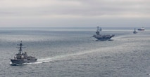 The Harry S. Truman Carrier Strike Group transits the Strait of Dover, Oct. 14, for the North Sea where the strike group will conduct operations with Allies and partners. The Harry S. Truman Carrier Strike Group (HSTCSG), is on a scheduled deployment in the U.S. Naval Forces Europe area of responsibility. (U.S. Navy photo by Mass Communication Specialist 3rd Class Mike Shen)