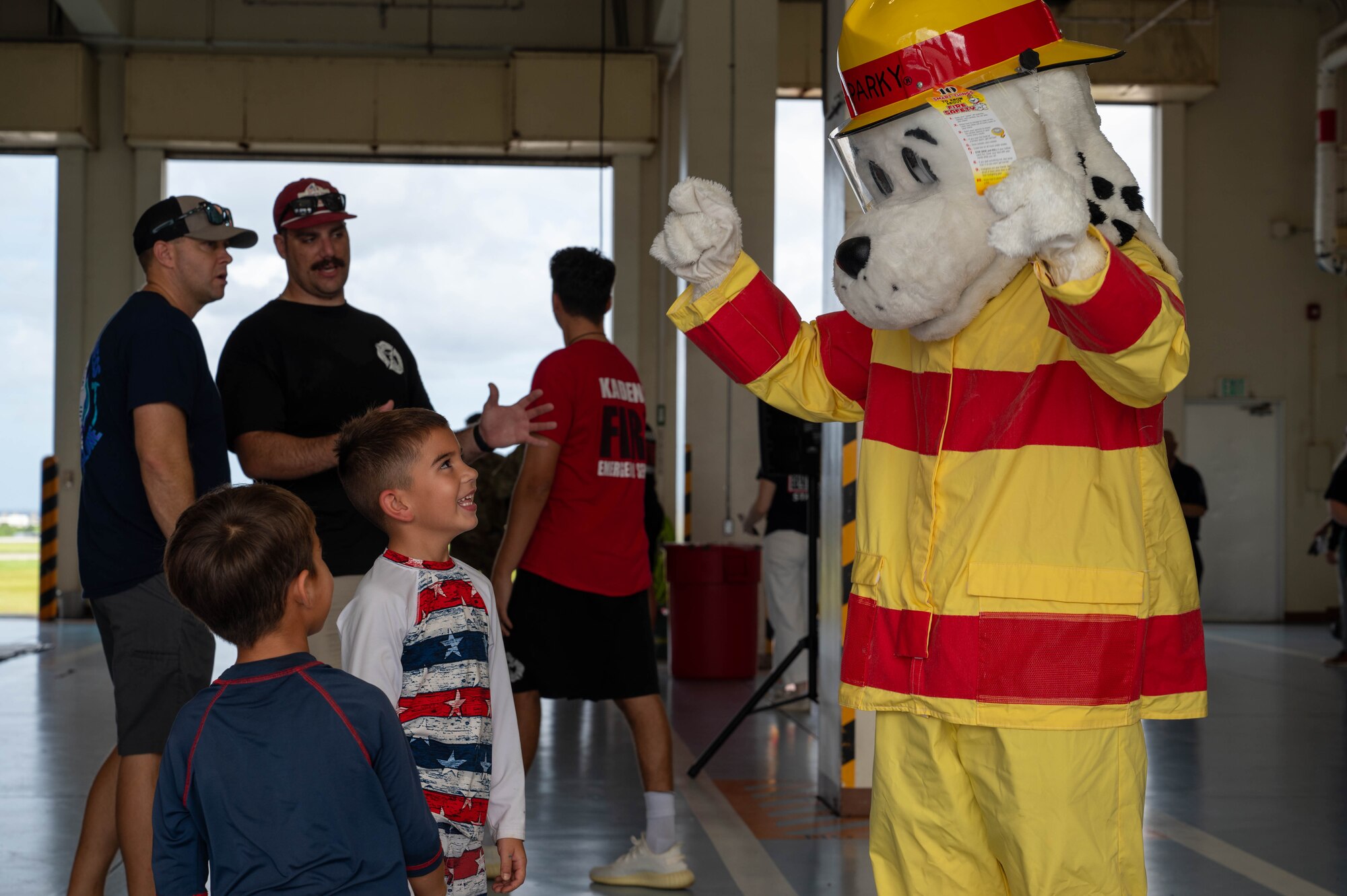 Sparky the Dog greeting participants at an open house event
