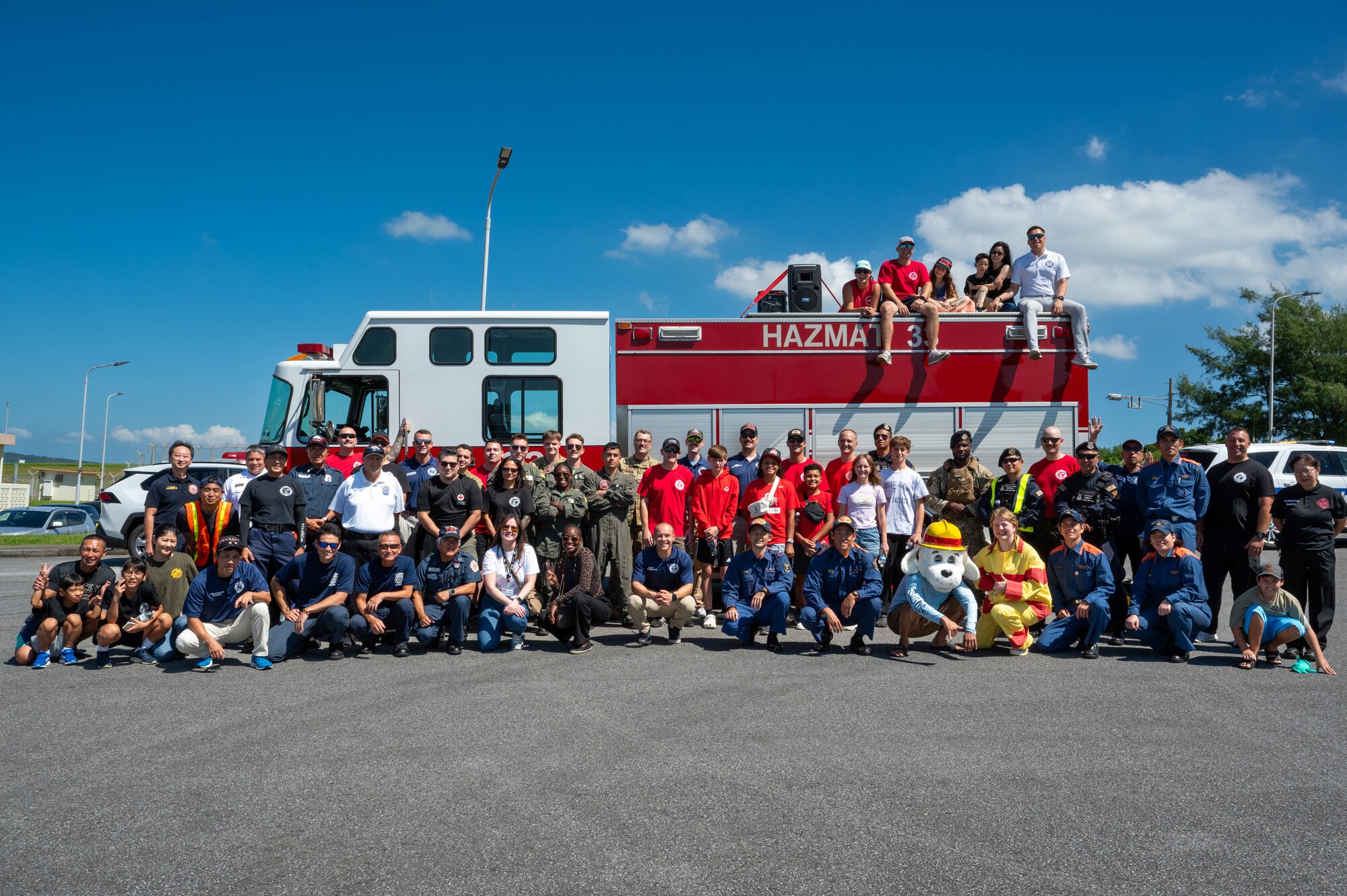 Group photo in front of a fire truck