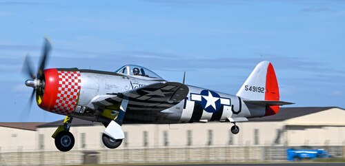 P-47 takes off from runway
