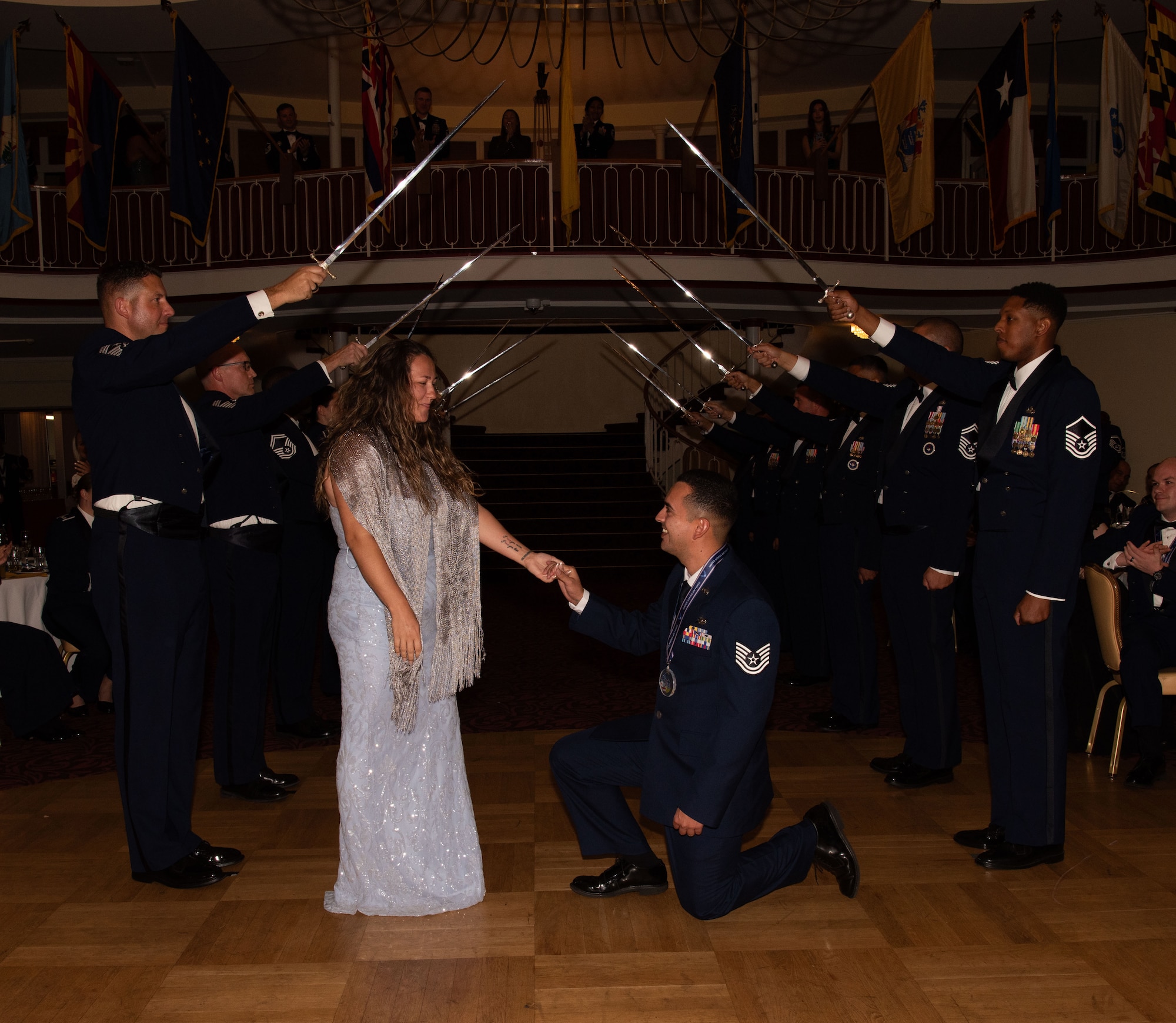U.S. Air Force Tech. Sgt. Jonathan Cortez proposes to U.S. Air Force Tech. Sgt. Katelynn Loughney.