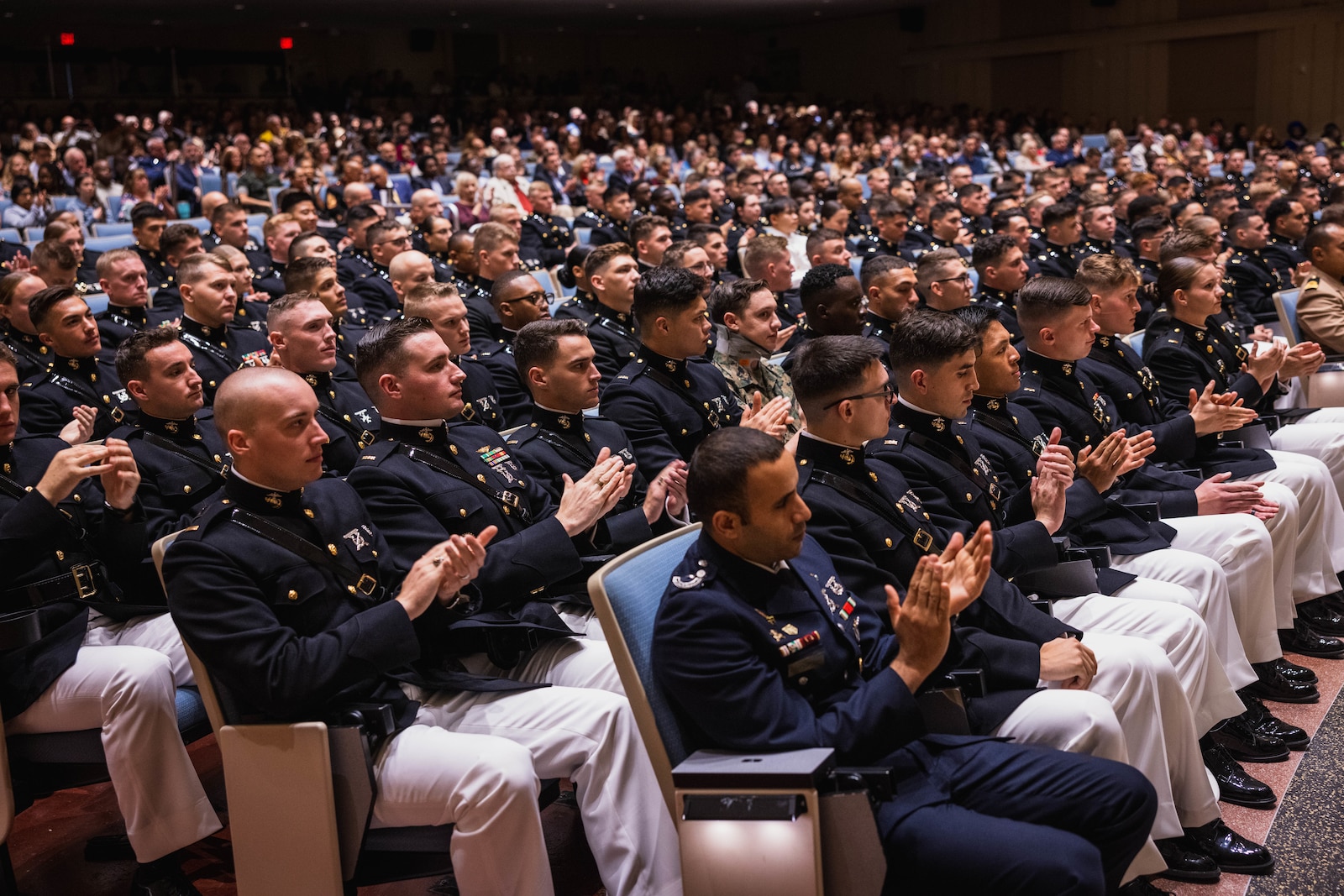 U.S. Marines with Charlie Company, class 3-24, The Basic School, applaud during their graduation ceremony on Marine Corps Base Quantico, Virginia, Oct. 10, 2024. Following graduation, the officers proceed to their respective military occupational specialty schools to gain their primary job skills knowledge and hone their leadership abilities. (U.S. Marine Corps photo by Lance Cpl. Joaquin Dela Torre)