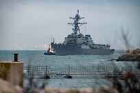 The Arleigh-Burke class guided-missile destroyer USS Oscar Austin (DDG 79) arrives to Naval Station (NAVSTA) Rota, Spain, completing its homeport shift to the installation from NAVSTA Norfolk, Va., Oct. 15, 2024.