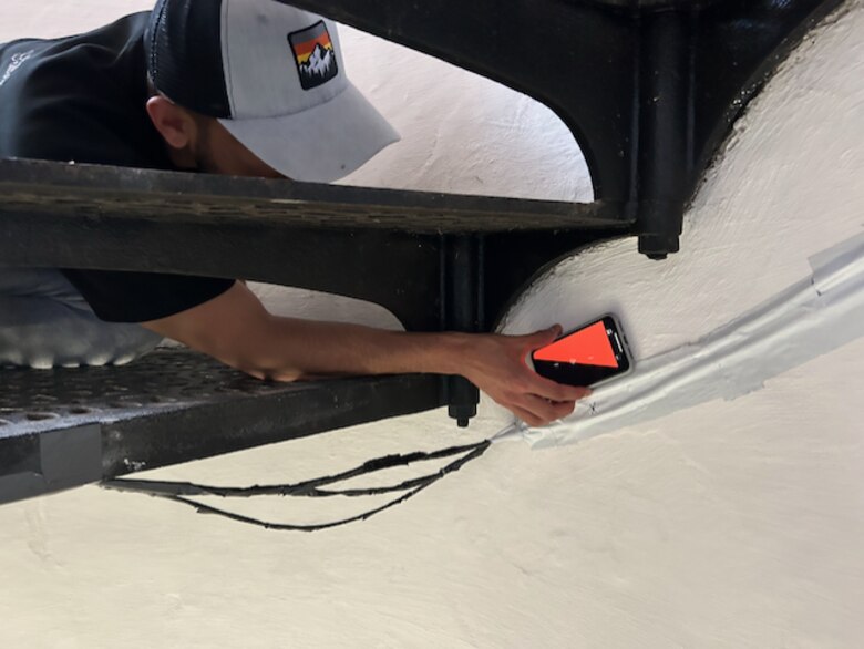 University of Wisconsin-Madison team member working with the fiber optic sensing to collect data