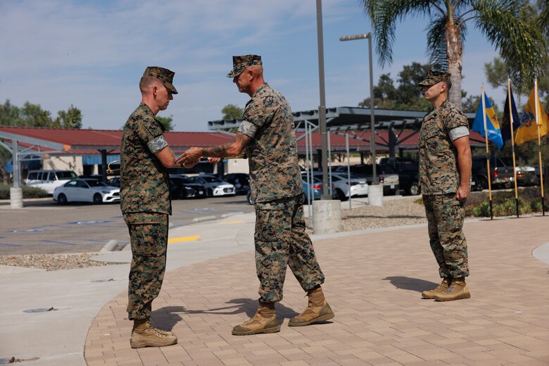 U.S. Marine Corps Sgt. Maj. Casey J. Pilkington, Wounded Warrior Battalion West battalion senior enlisted leader, speaks during a relief and appointment ceremony at Marine Corps Base Camp Pendleton, Calif., Oct. 4, 2024. During the ceremony, Sgt. Maj. Robert L. Leatherman relinquished the responsibility of command senior enlisted leader for Wounded Warrior Battalion West to Sgt. Maj. Casey J. Pilkington. The ceremony represents the transfer of authority and accountability from the outgoing command senior enlisted leader to the incoming command senior enlisted leader. (U.S. Marine Corps photo by Lance Cpl. Jeslianne A. Torres).