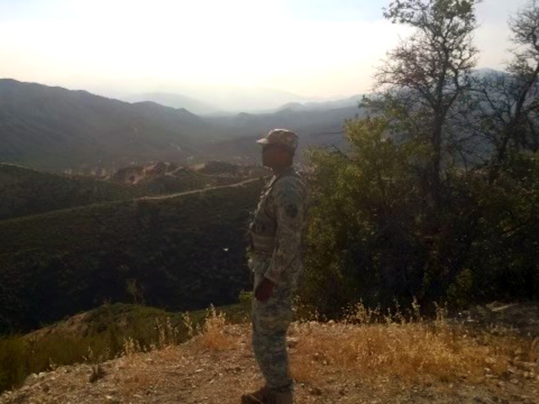 Sgt. Quintis Reese stands at the Pakistan/Afghanistan border