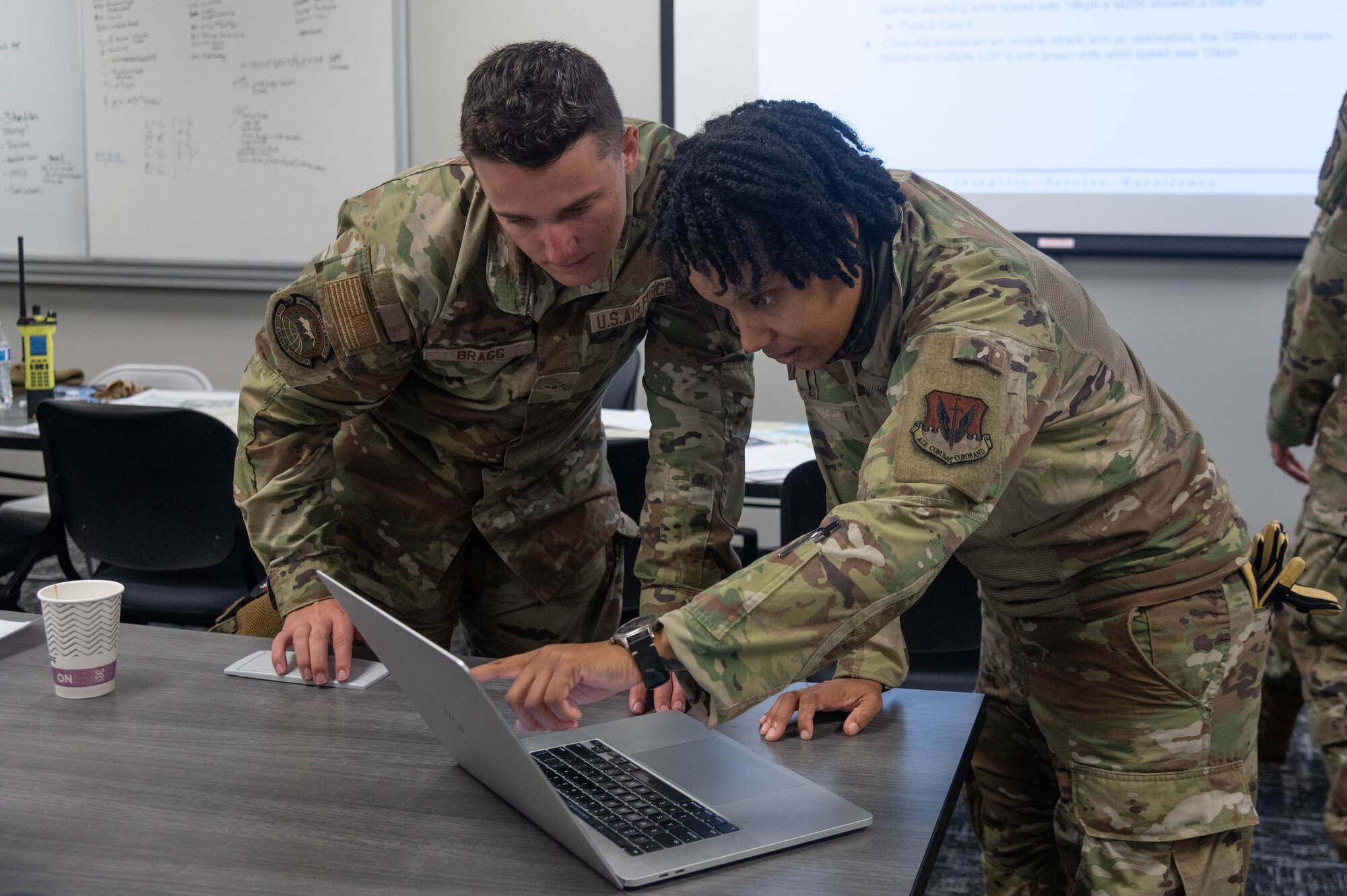 West Virginia Air National Guard Airman 1st Class Gideon Bragg, emergency management specialist, 130th Civil Engineer Squadron, and D.C. Air National Guard Staff Sgt. Tijuana Hurston, emergency management specialist, 113th Civil Engineer Squadron, participate in a simulated CBRN cell for the Region 3 Battlefield Experience Learning (R3BEL) exercise, a local training event that enhanced emergency readiness and response within a simulated deployment environment, at the 70th Regiment Regional Training Institute, Aberdeen Proving Ground - South in Edgewood, Maryland, September 26, 2024.