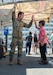 Alaska Army National Guard Staff Sgt. Sean Smack spends time getting to know the residents at his recruiting booth during the Blueberry Arts Festival in Ketchikan, Alaska, Aug. 3, 2024. Smack has been the only recruiter covering Juneau, Ketchikan, Sitka and others for more than three years. (Alaska Army National Guard photo by Sgt. Marc Marmeto)