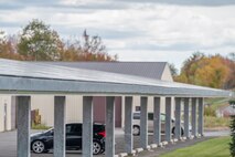 Photo of vehicles under charging station