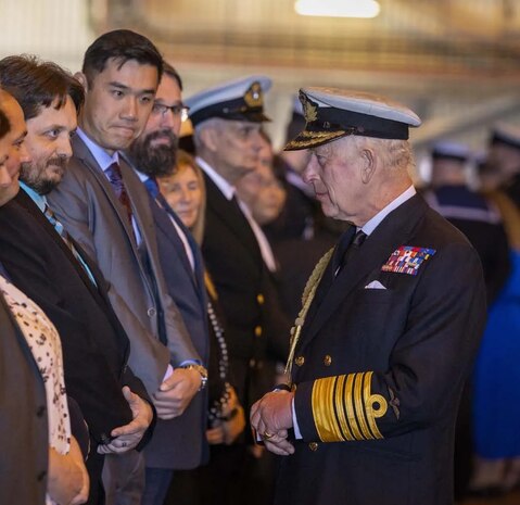 FASLANE, Scotland - Mr. John Chow, forth from left, general engineer for Strategic Systems Programs (SSP), took part in an event between His Majesty King Charles III and Royal Navy submariners and their families at Coulport, part of HM Naval Base Clyde, on 19 September, 2024. King Charles III visited Coulport to show his appreciation of the Royal Navy’s submariners and their families, thanking them for their valuable service. The king also met with a group of Gold Deterrent Pin holders, who were recognized for spending the greatest amount of time under water while on strategic patrol.