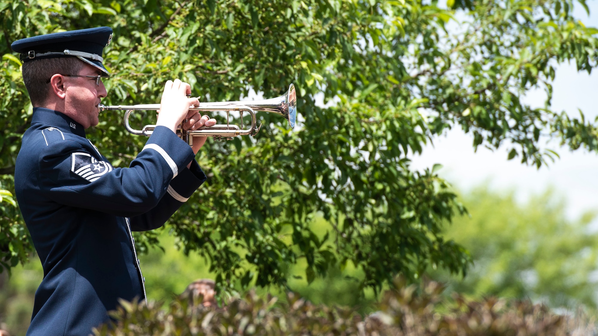 Mike Richter playing the trumpet.