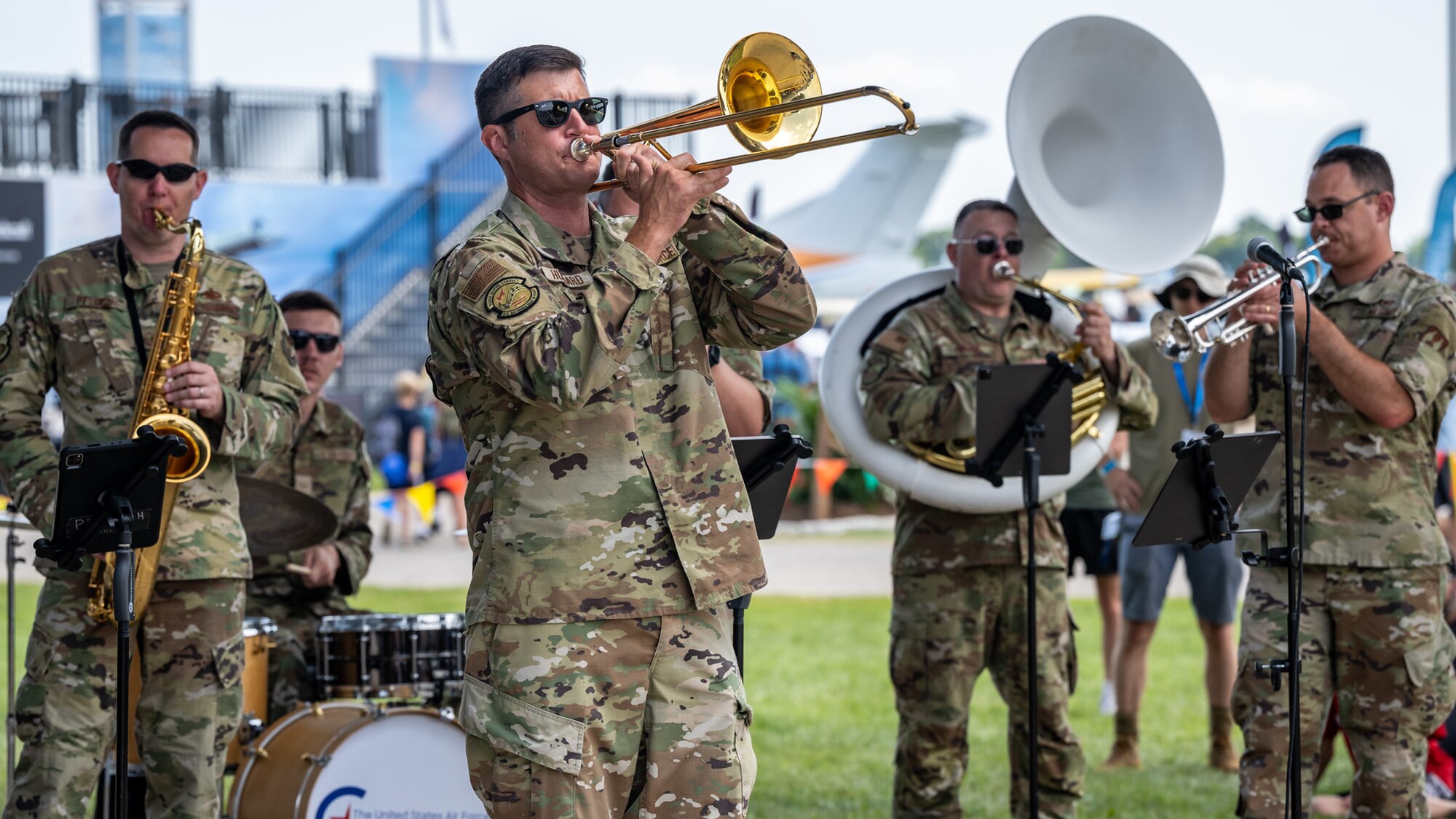 Spirit of Freedom performs at EAA Air Venture Air Show while Jimmy Hubbard takes a solo.