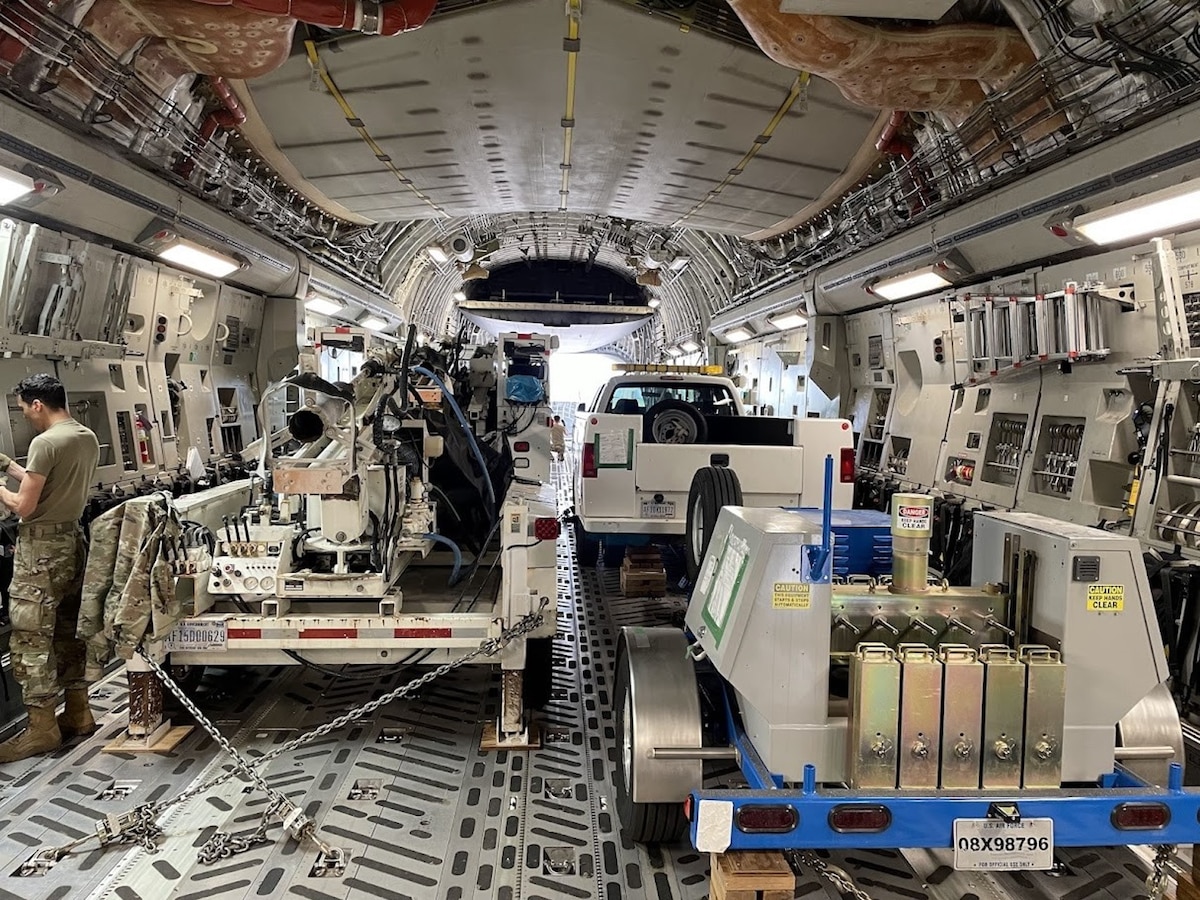 Airfield Pavement Evaluation team equipment is loaded on a C-17