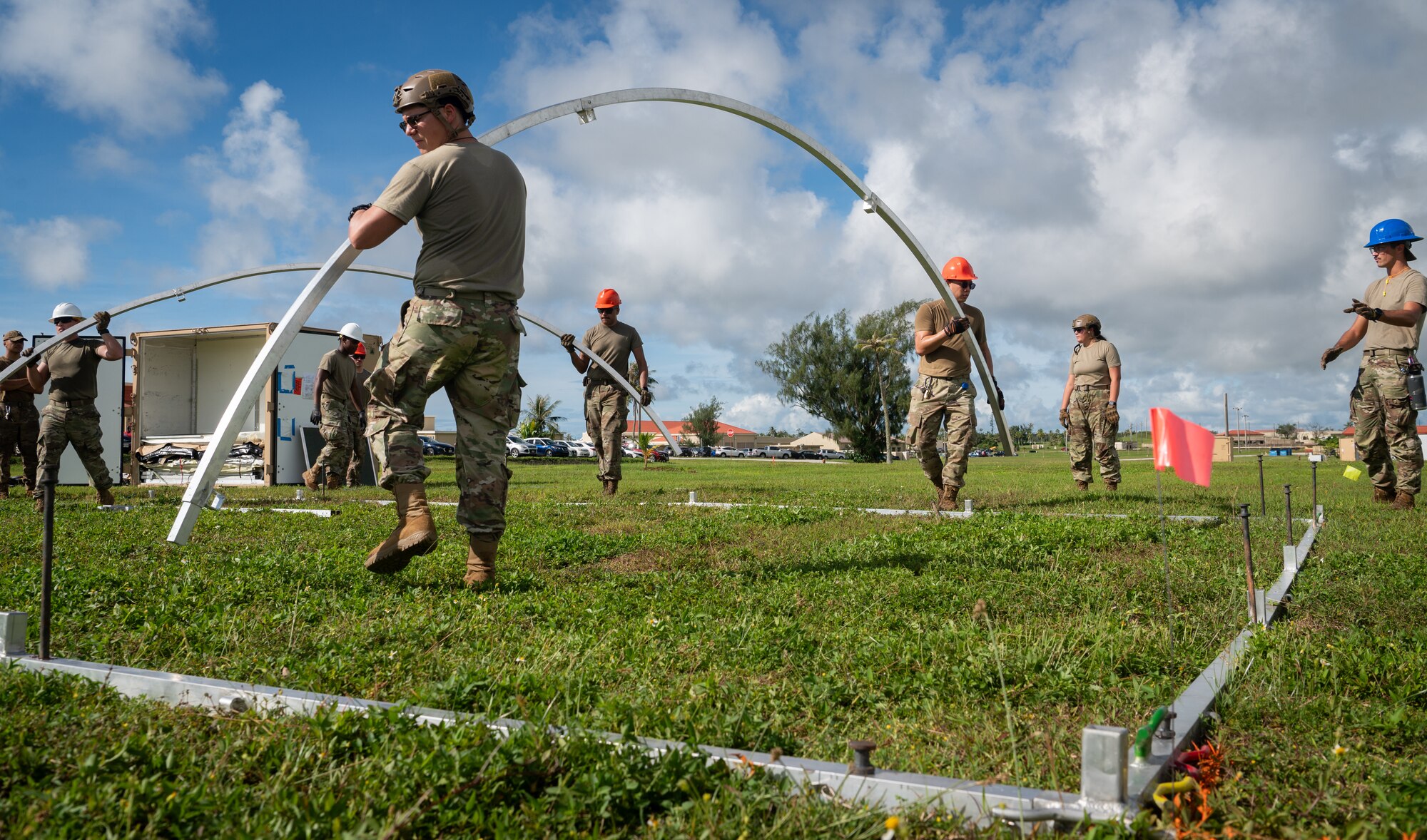 36th Civil Engineer Squadron Airmen prepare tent structures for the Operation Readiness Exercise, Slingstone 24-4, at Andersen Air Force Base, Guam, Oct. 15, 2024. This exercise is to showcase Andersen AFB capabilities to deter opportunistic acts of aggression through forward presence and the ability to rapidly respond to crises. (U.S. Air Force photo by Staff Sgt. Pedro Tenorio)