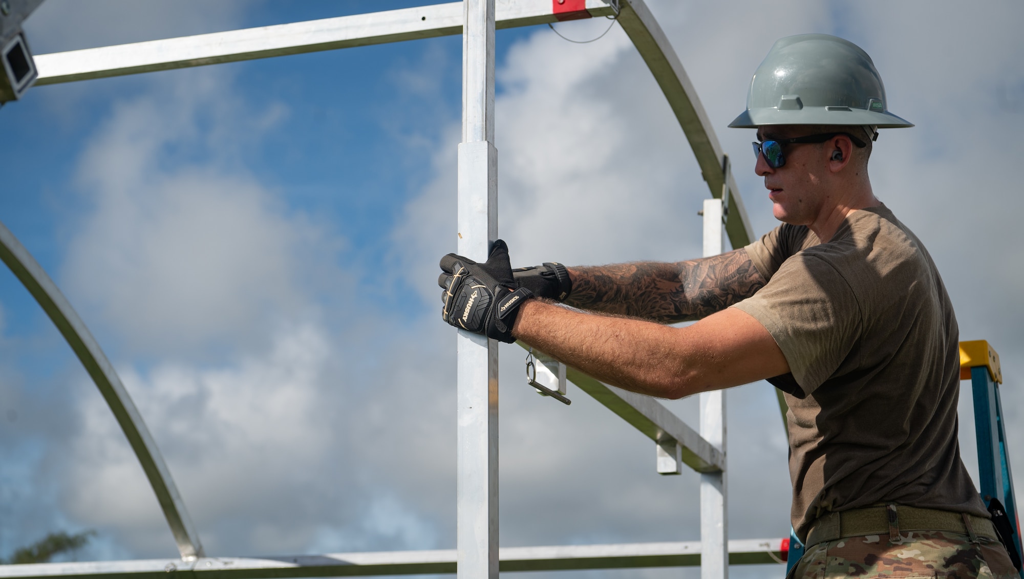 36th Civil Engineer Squadron Airmen prepare tent structures in preparation for Slingstone 24-4 at Andersen Air Force Base, Guam, Oct. 15, 2024. This exercise is to showcase Andersen AFB capabilities to deter opportunistic acts of aggression through forward presence and the ability to rapidly respond to crises. (U.S. Air Force photo by Staff Sgt. Pedro Tenorio)