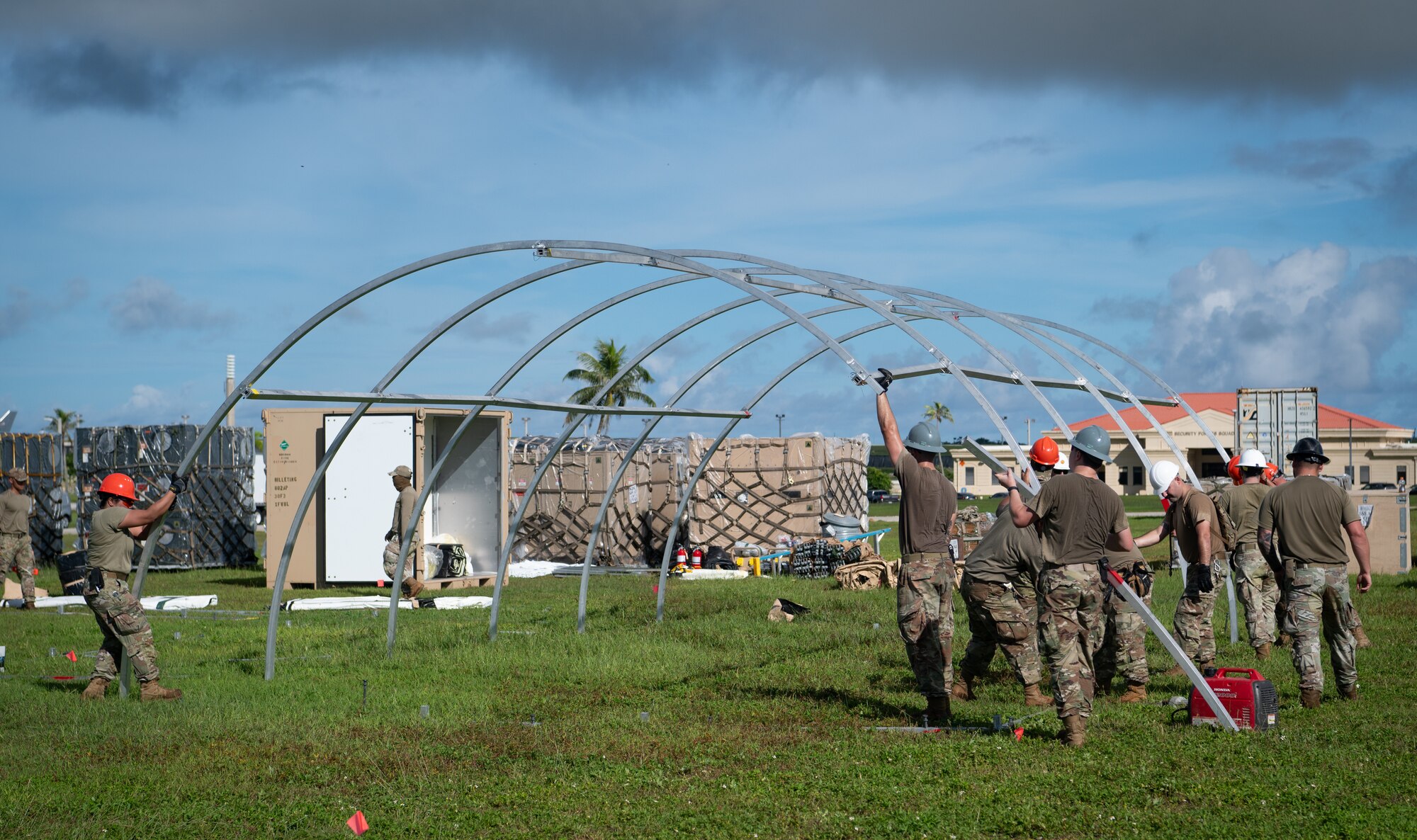 36th Civil Engineer Squadron Airmen prepare tent structures in preparation for Slingstone 24-4 at Andersen Air Force Base, Guam, Oct. 15, 2024. This exercise is to showcase Andersen AFB capabilities to deter opportunistic acts of aggression through forward presence and the ability to rapidly respond to crises. (U.S. Air Force photo by Staff Sgt. Pedro Tenorio)