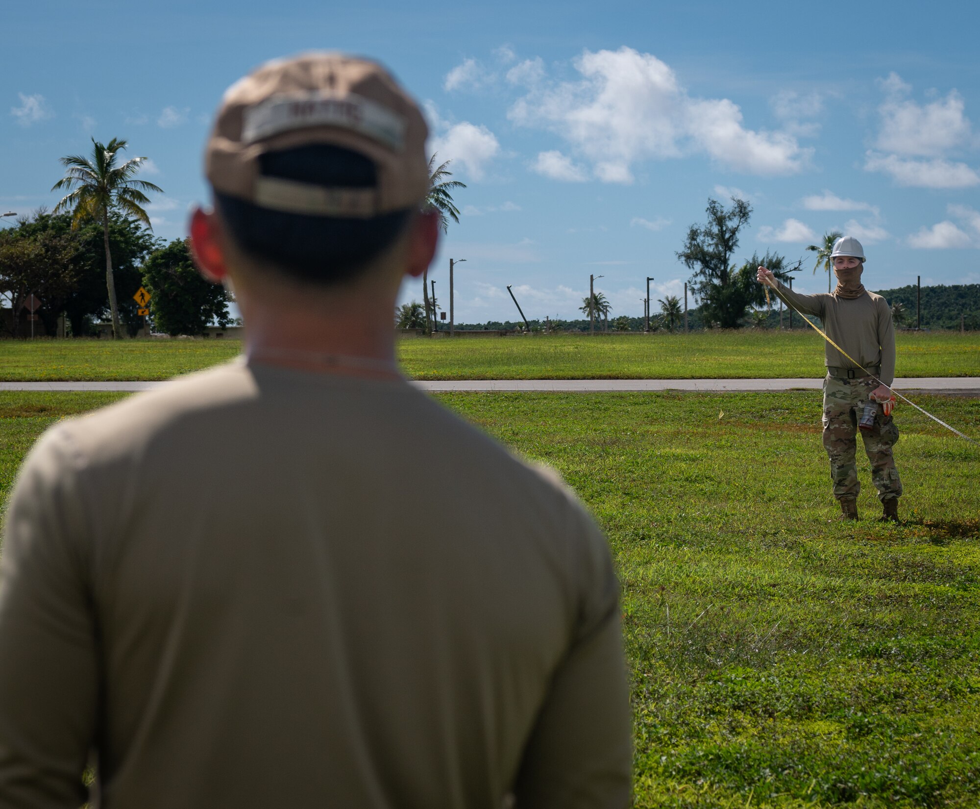 36th Civil Engineer Squadron Airmen measure tent plots in preparation for Slingstone 24-4 at Andersen Air Force Base, Guam, Oct. 15, 2024. This exercise empowers the Airmen of the 36th Wing to take charge of their training, and allows leadership to evaluate Andersen's ability to execute the pacing OPLAN. (U.S. Air Force photo by Staff Sgt. Pedro Tenorio)