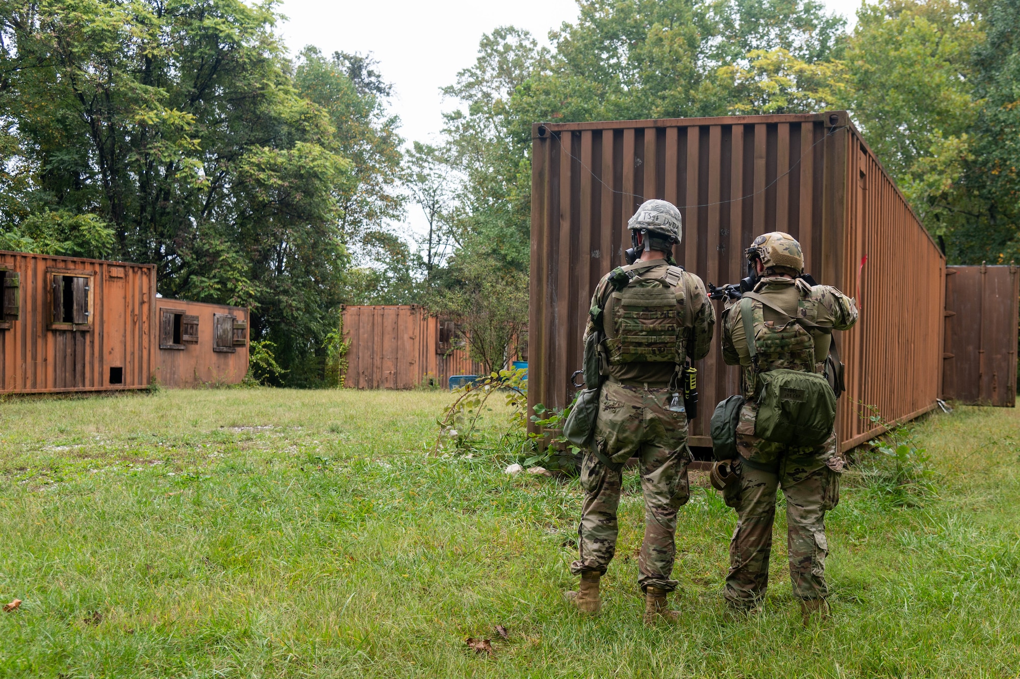 Ohio Air Force Reserve Tech. Sgt. Donald Duda, emergency management journeyman, 910th Civil Engineer Squadron, West Virginia Air National Guard, and Airman 1st Class Gideon Bragg, emergency management specialist, 130th Civil Engineer Squadron, navigate simulated urban operations in the Region 3 Battlefield Experience Learning (R3BEL) exercise, a local training event that enhanced emergency readiness and response within a simulated deployment environment, at the Blum Military Reservation in Glen Arm, Maryland, September 26, 2024.