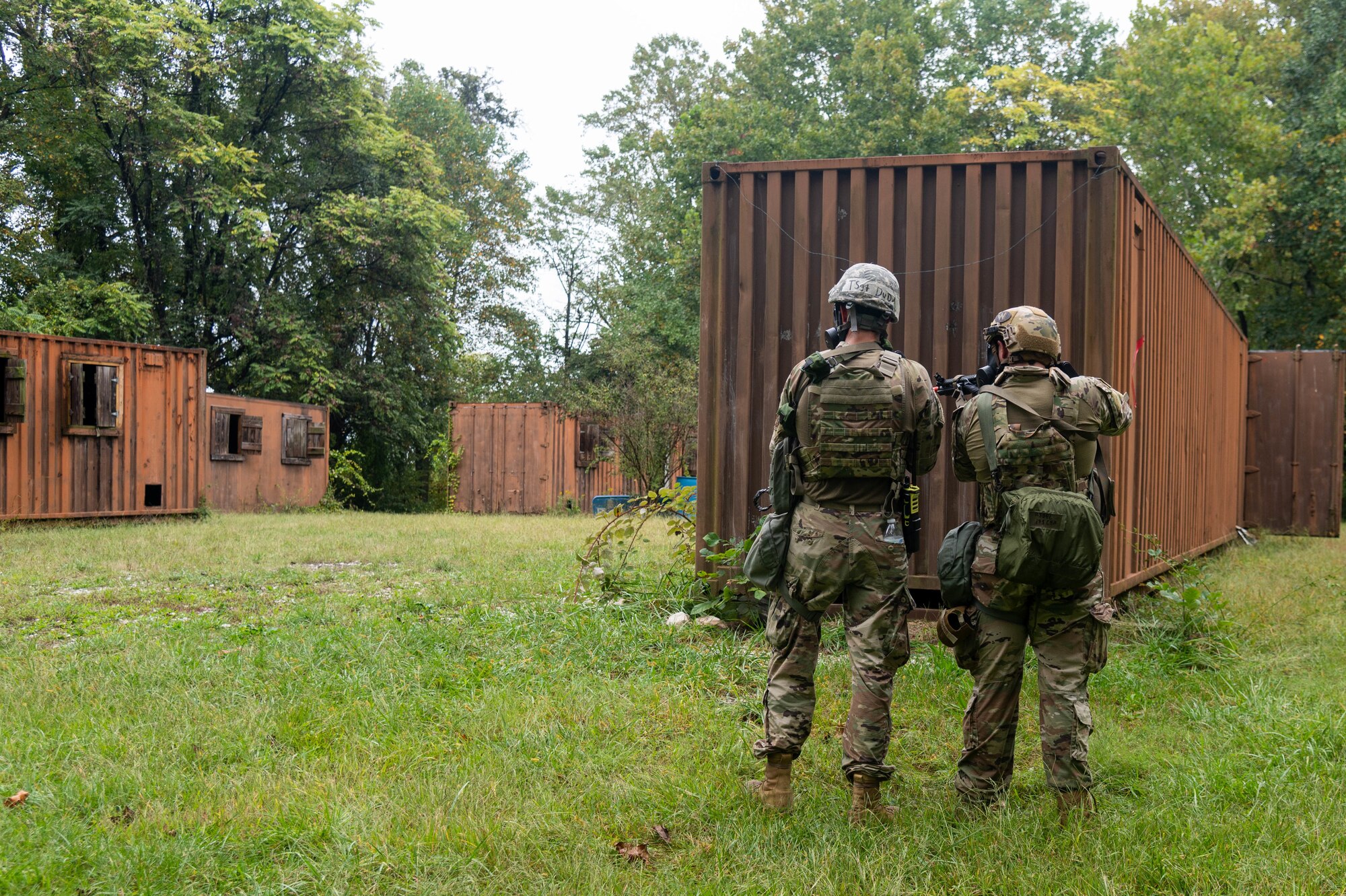 Ohio Air Force Reserve Tech. Sgt. Donald Duda, emergency management journeyman, 910th Civil Engineer Squadron, West Virginia Air National Guard, and Airman 1st Class Gideon Bragg, emergency management specialist, 130th Civil Engineer Squadron, navigate simulated urban operations in the Region 3 Battlefield Experience Learning (R3BEL) exercise, a local training event that enhanced emergency readiness and response within a simulated deployment environment, at the Blum Military Reservation in Glen Arm, Maryland, September 26, 2024.