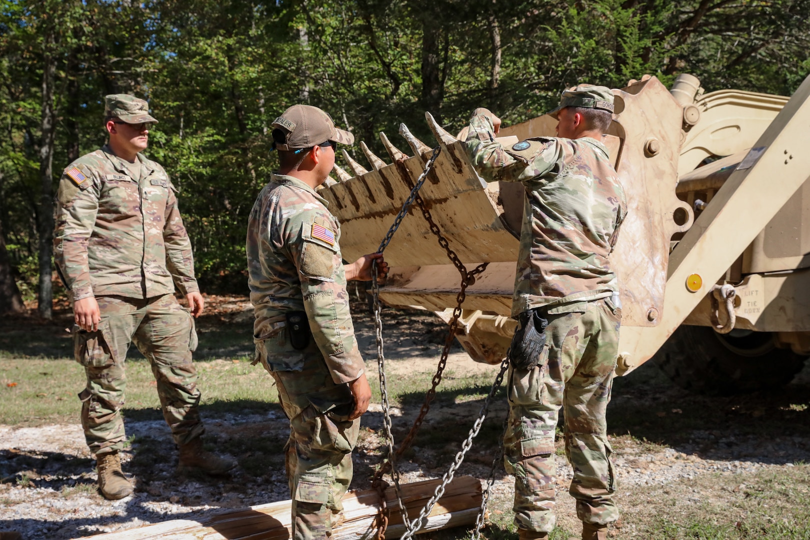 North Carolina National Guardsmen with the 113th Sustainment Brigade and the 30th Armored Brigade Combat Team conduct bridge-building operations in Nebo, N.C., Oct. 9, 2024, to connect roads for residents following Tropical Storm Helene.