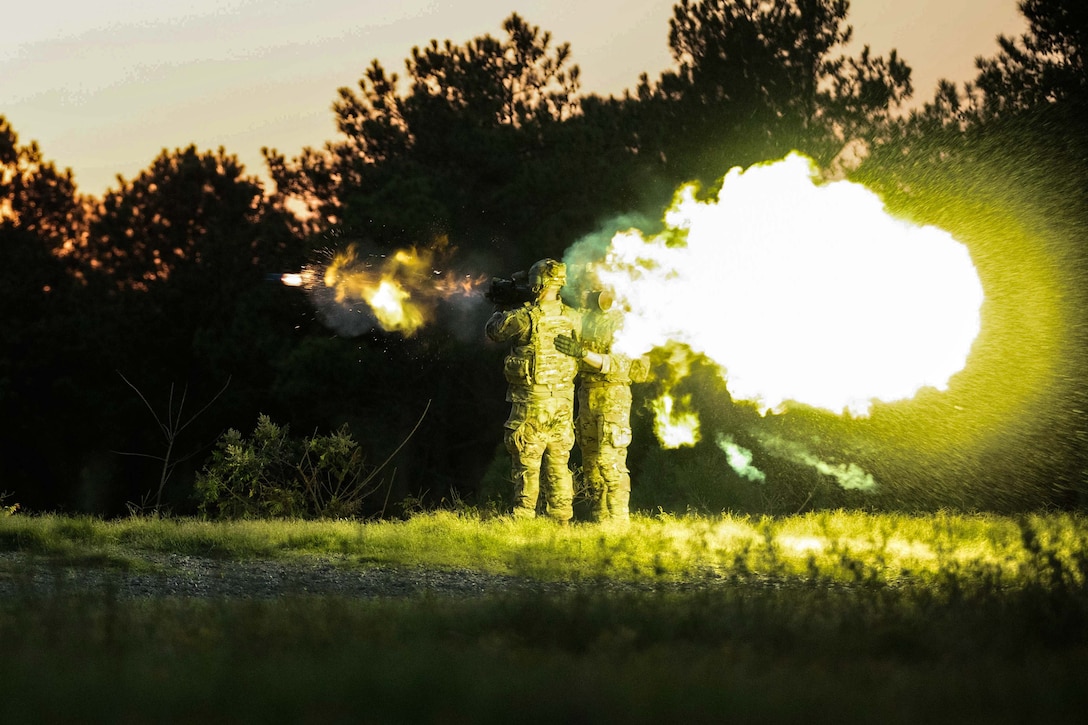 An Army paratrooper fires a multi-role, anti-armor, anti-personnel weapon system known as the Carl Gustaf recoilless rifle during a training exercise at Fort Liberty, N.C., Sept. 5, 2024.