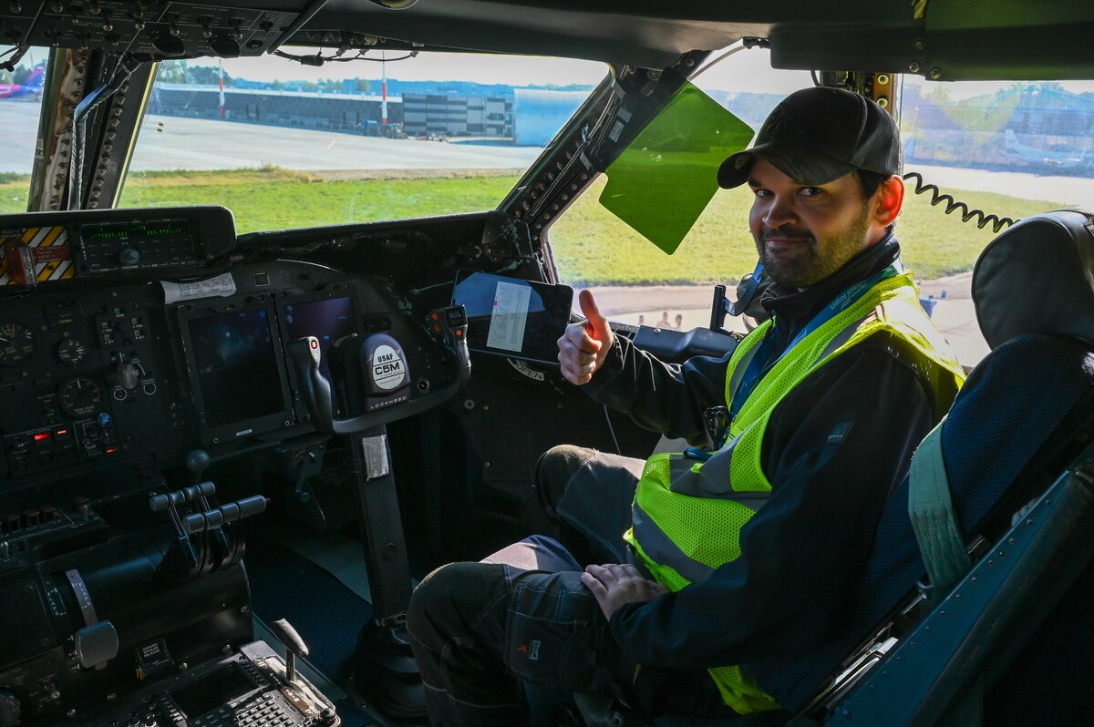 Tomas Pieter, Ostrava Airport cargo handling manager, poses for a photo in the flight deck of a C-5M Super Galaxy during a tour lead by 68th Airlift Squadron aircrew at Leoš Janáček Airport, Czech Republic, Sept. 21, 2024.