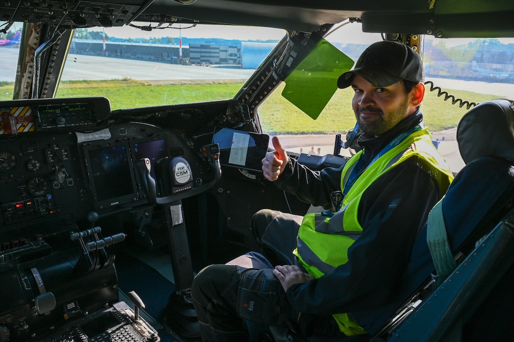 Tomas Pieter, Ostrava Airport cargo handling manager, poses for a photo in the flight deck of a C-5M Super Galaxy during a tour lead by 68th Airlift Squadron aircrew at Leoš Janáček Airport, Czech Republic, Sept. 21, 2024.